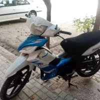 موتور تی وی اس مدل 90 سفید آبی