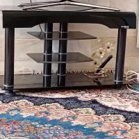 میز تلویزیون شیشه ای درحد نو