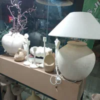 اکسسوری منزل دیزاین گلدان و اباژور و شمعدان