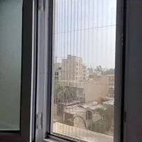 در وپنجره ی پی وی سی درب چوبی