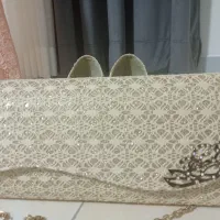 یک عدد لباس مجلسی و کیف و کفش مجلسی|لباس|بومهن, |دیوار