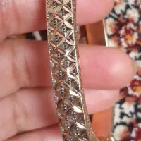 دستبند سیاه قلم طلا