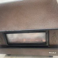 بخاری گازی نیک کالا طرح شومینه سالم