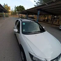 کوئیکR مدل 1401 سفید-مشکی