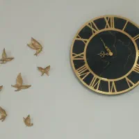 ساعت رزین و پروانه