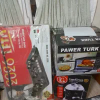 اجاق گاز رومیزی وجارو برقی و توستر یخچال و کامپوتر