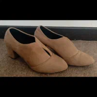 کفش نو|کیف، کفش، کمربند|صدرا-فارس, فاز ۲|دیوار