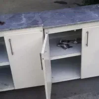 کابینت اهنی اپن با سنگ روی ان