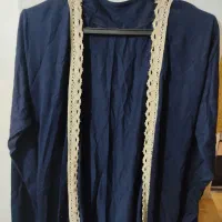 تعدادی لباس به علت جمع آوری مغازه|لباس|رشت, بازار|دیوار