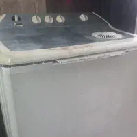 یک عدد لباسشویی وابگرمکن