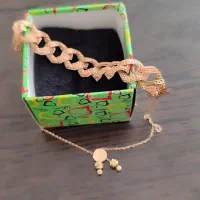 دستبند سویسی و پلاک زنجیر در حد نو