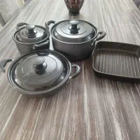 سرویس قابلمه تفلون عروس و تابه چدن