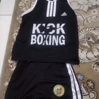 وسایل کیک بوکسینگ و کفش فوتبال