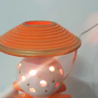 چراغ خواب سفالی و لامپ هالی استار آبی ۸ وات