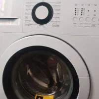 لباسشویی نو در حد خشک|ماشین لباسشویی و خشک‌کن لباس|سرباز, |دیوار