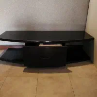 میز تلویزیون چوب و با صفحه شیشه ایی خارجی