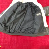 کاپشن|لباس|مشهد, طبرسی شمالی|دیوار