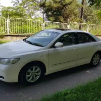 فروش ماشین تویوتا کمری سفید بی رنگ