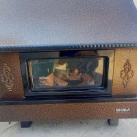 بخاری گازی شومینه ای نیک کالا