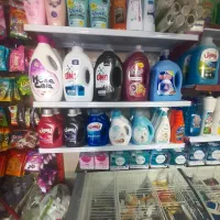 نیرو و شاگرد سوپر مارکت با تجریه چیدمان صندوق فروش