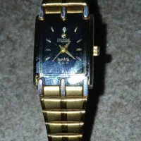 ساعت در حد نو رنگ طلایی ثابت