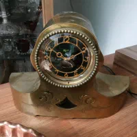 ساعت قدیمی برنجی