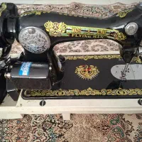چرخ خیاطی مرد پرنده برقی