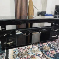 زیر تلویزیونی شیشه ای