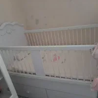 تخت گهواره ای نوزاد