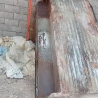 لوازم نیسان استارد دیناب درب عقب رادیات