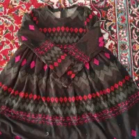 تعدادی پیراهن بچگانه در حد نو