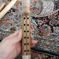 آلات موسیقی نی بوشهری|سازهای بادی|شیراز, پودنک|دیوار