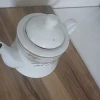 قوری توس به همراه ست کفگیر نسوز وخردکن دستی کوچک