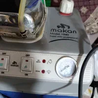 یک دستگاه اتو بخار