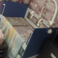 تخت کودک و آویز تخت