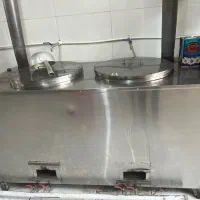 دیگ پخت و کانتر گرم
