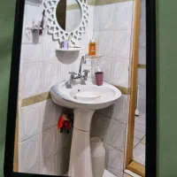 روشویی و شیر آب و آینه