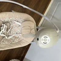 نی نی لالای برقی ب همراه صندلی ماشین