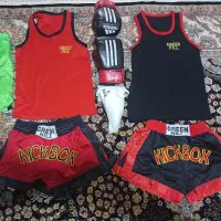 دوعدد لباس بکس و دوعدد لباس تکواندو به همراه وسایل