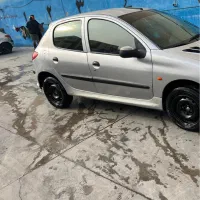 پژو206مدل ۱۳۸۲ نقره ای تیپ ۲ اقساطی چکی در حد۹۵