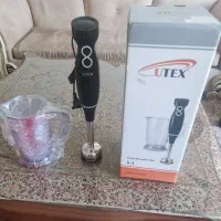 هم زن و گوشت کوب آکبند و سیزی خرد کن