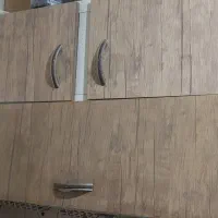 فروش تعدادی کابینت چوبی و یک اجاق گاز در حد نو