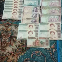 اسکناس۲۲ عدد که ۸ عدد ۱۰۰ تومانی هم سری و بانکی