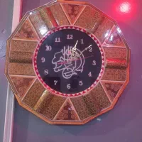 تعدادی ساعت دیواری رومیزی و مچی