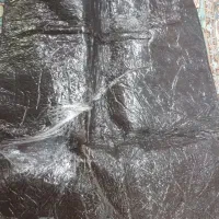 لواشک آلو سیاه ترش و شور نرم