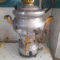 سماور ۶لیتری گازی درحد نو نقره ای طلایی