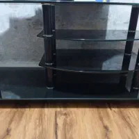 میز تلویزیون شیشه ای تمیز و شیک