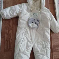 کاپشن سرهمی جواراب دارهمراه با کلاه نوزاد ۴۰۰