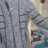 پالتو.مانتو.لباس|لباس|قدس, شهر‌قدس|دیوار