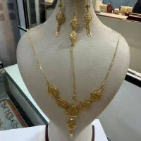 سرویس طلا و النگو|جواهرات|بافت, |دیوار